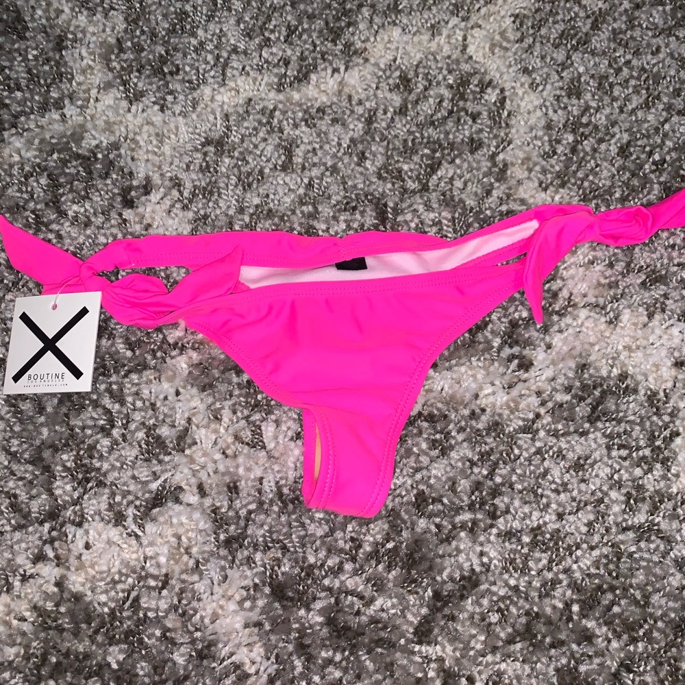 Hot pink Boutinela bottoms.